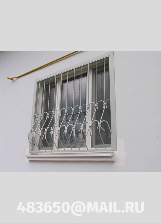 На фото Металлические решетки на окна. модель №5 на заказ в Орле