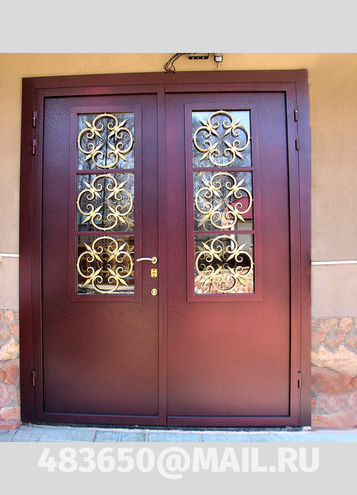 На фото Входные металлические двери с ковкой, модель №21 на заказ в Орле